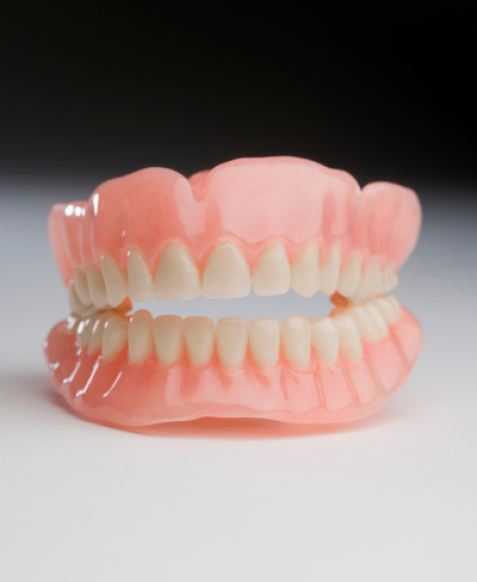 WHAT IS A DENTURE OR PARTIAL?